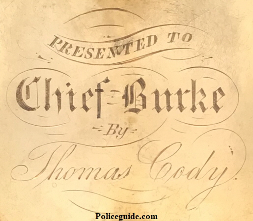 Reverse of Chief Martin Burke’s badge showing the presentation.  