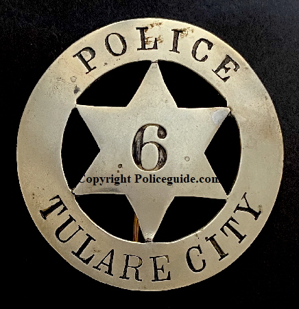 Police Tulare City, made of nickel with T-pin.  Extra large size.