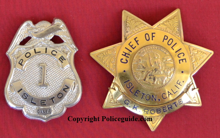Isleton police badge #1 and Chief of Police badge personalized to G. K. Roberts.