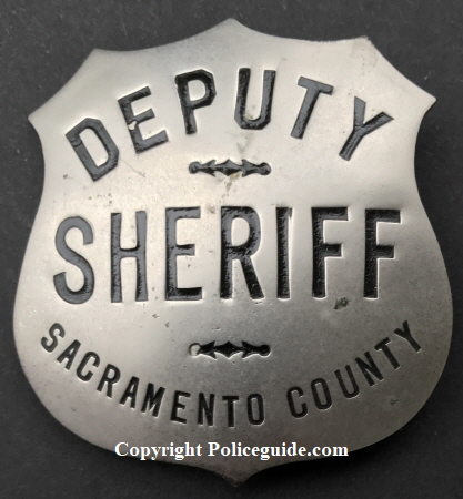 Sacramento Deputy Sheriff badge, nickel shield, hallmarked Ed Jones & Co. circa 1924.