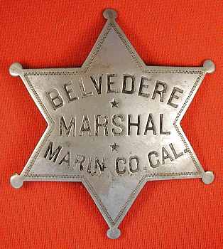 First issued Marshal badge from Belvedere, Marin Co. Cal.  Belvedere was incorporated in 1896.  Thanks to Belvedere Chief of Police Mark Campbell for this information:  �The first Marshal was N.A. McLean who served until 1923.  During this time Frank Crosby served as Deputy Marshal.�  The badge is a large �pie plate� style at 3 1/2� tall, made of nickel with nickel plate.  Maker is L. H. Moise S.F. Cal.  Considered Rare.