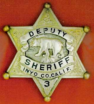 Inyo Co. deputy sheriff badge number 3. Sterling silver with gold wash, nice layered badge by Ed Jones Co. Worn by Cub Culbertson. Inyo Co. deputy sheriff badge number 3. Sterling silver with gold wash, nice layered badge by Ed Jones Co. Worn by Cub Culbertson.