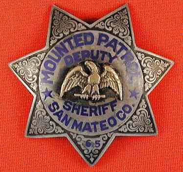 Sterling silver San Mateo Co. Sheriff's Mounted Patrol Deputy Sheriff badge made by Olson Nolte.  Gold filled center eagle.