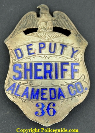 Alameda Co. Deputy Sheriff badge #36, sterling silver, hand engraved.  This badge belonged to Earl Warren and was obtained by noted Alameda County historian and collector James Bolander.