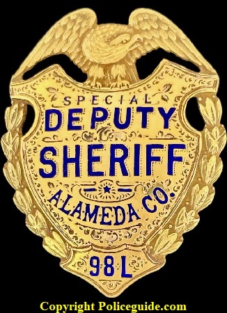 Alameda Co. Special Deputy Sheriff shield No. 98L, made by Ed Jones Co., Gold Front, hand engraved, hard blue enameled lettering.  Issued to P. Louie.