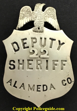 Eagle top shield with applied numbers.  Nickel silver.  SKU1877