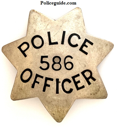 San Francisco Police badge #586, made by  J.C. Irvine Market St. SF. Sterling.  