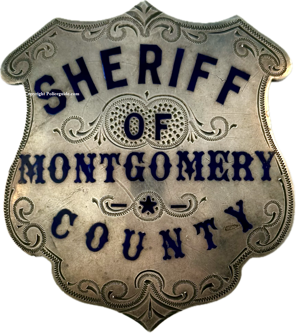 Sheriff Montgomery Co. MO shield of J. T. Hunt.  Back of badge the presentation reads:  From M.R.C. to J.T. Hunt., made by Wirth & Jachens S. F. circa 1900.