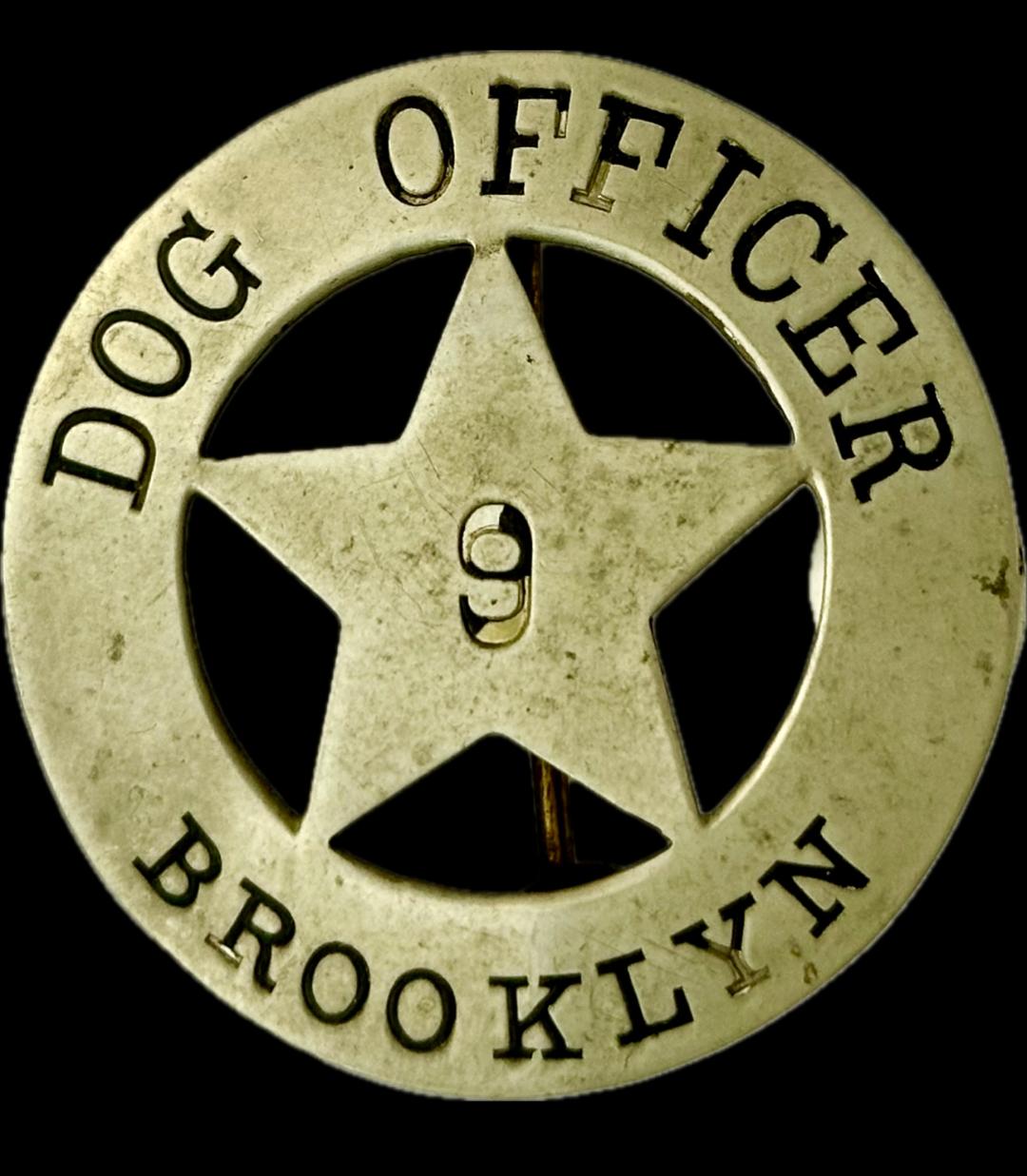 Dog Officer No. 9, circle cut out star, made by 