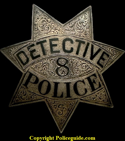 This early Chico police Detective badge #8 is made of sterling silver and is beautifully hand engraved.  It was part of the Charles Hunter collection.