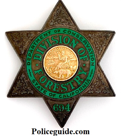 Dept of Conservation. Division of Forestry badge #694