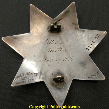 Back of Chico badge showing presentation and makers marks:  Gibson to Martin Nov. 11, 1913.  Hallmark Irvine & Jachens 1027 Market St. S. F. and dated 11-1-13.