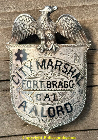 City Marshal Fort Bragg CAL shield of A. A. Lord, made of sterling silver with hard fired black enamel and hand engraved.