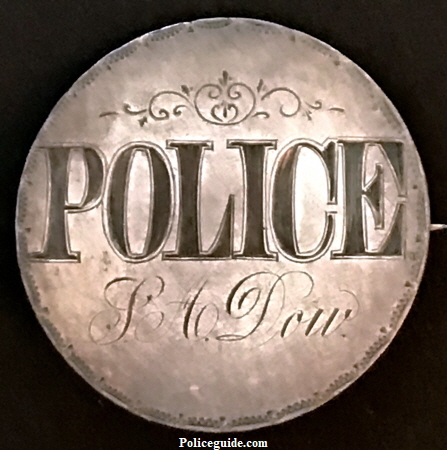 Dow Police Coin badge