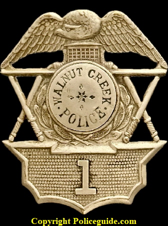 Walnut Creek PD hat badge No. 1