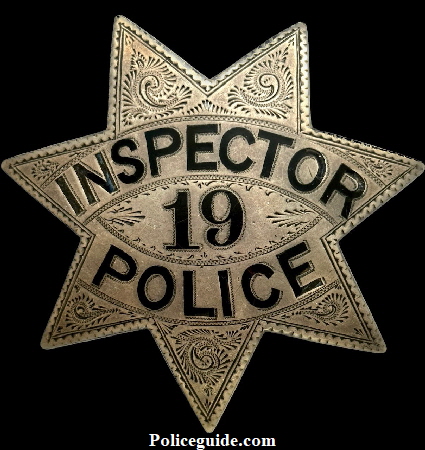 Oakland Police Inspector star #19 made by Pioneer 705 Bdwy. Oakland.  Badge is sterling silver with hard fired black enamel and worn by J. S. Dufton who was appointed 1-1-1896.  He was born 2-12-1875.