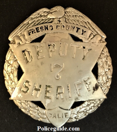 Fresno Co. deputy sheriff badge #7 made by Fresno Rubber Stamp Co. circa 1915.