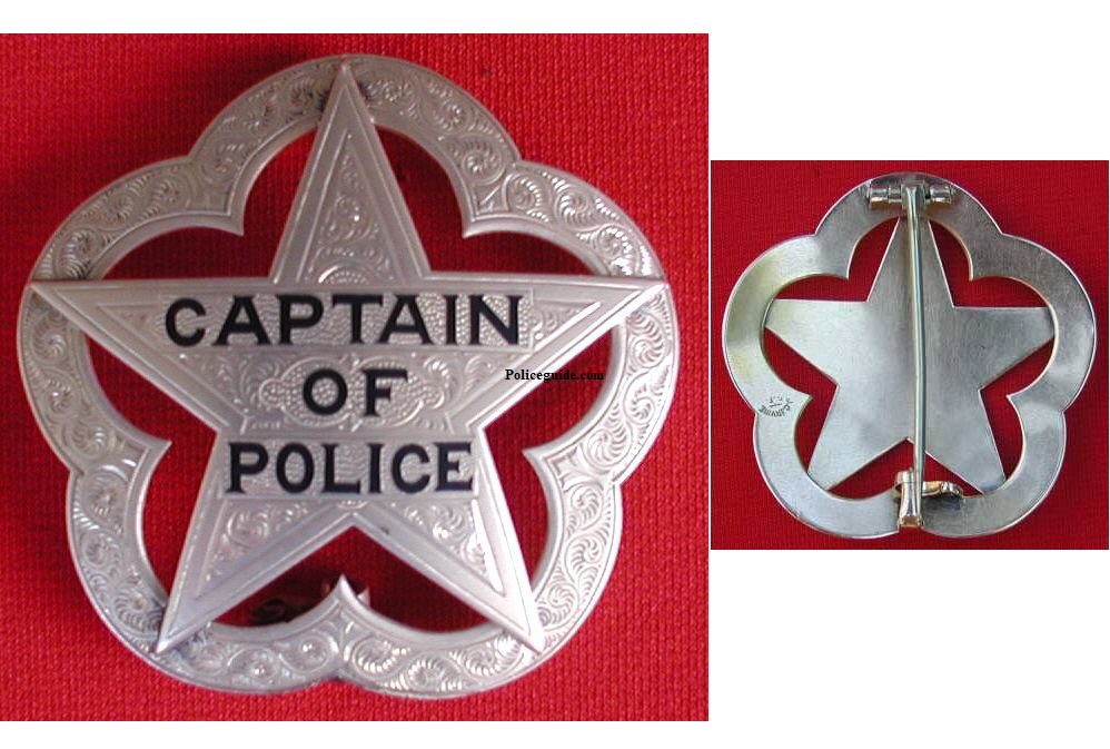 M O Anderson Captain of Police badge