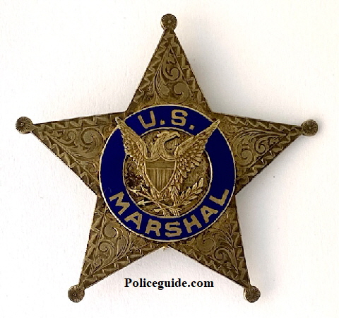 U. S. Marshal for the Hawaiian Islands, sterling and hand engraved badge, circa 1923.  Hallmarked:  D. B. (Dawkins Benny) sterling.