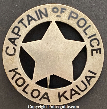 Captain Koloa Kauai Police badge, sterling with hard fired black enamel, circa 1924.  Worn by Medeiros Antone.