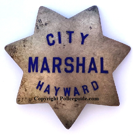 Last Hayward City Marshal badge worn by F. P. Schilling.  Sterling silver and made by Ed Jones Co. Oakland, CAL