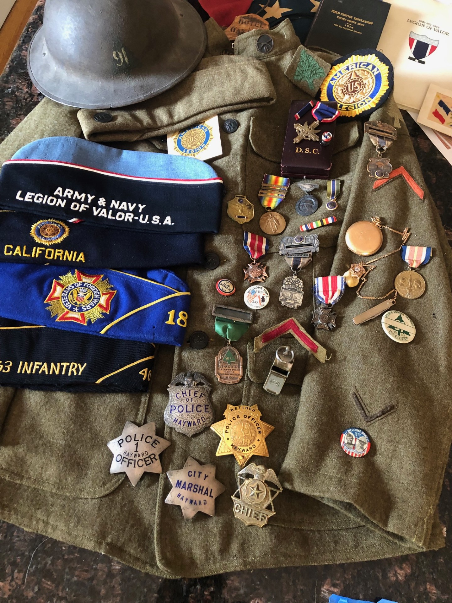 Louis Silva Police and Military medals, badges and other memorabilia.