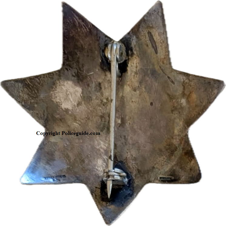 This is the star Eugene Doran was wearing at the time of his death.  It’s made of sterling silver with hard fired blue enamel and is hallmarked Irvine & Jachens S. F. STERLING.