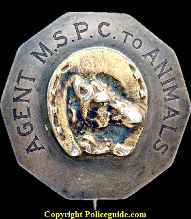 Agent M.S.P.C. to Animals shield with a Horse head inside a horseshoe center seal.  T-pin and C-catch.  Researching to determine location.
