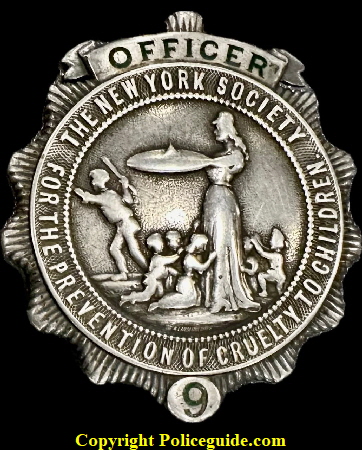 Extremely rare, Officer The New York Society for the Prevention of Cruelty to Children, shield No. 9.  Sterling silver, T-pin.