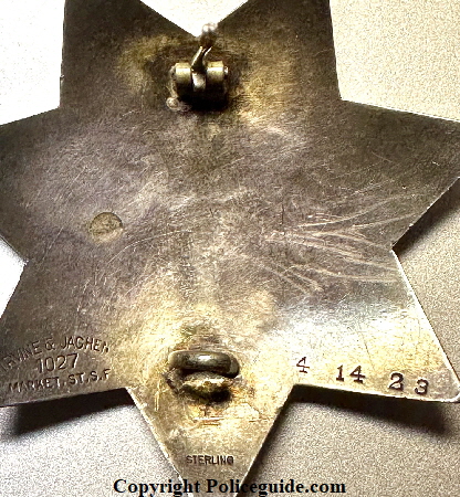 Back of star showing the hallmark of Irvine & Jachens 1027 Market St. S.F.   STERLING and dated 4 14 23.