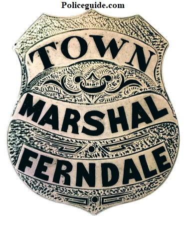 Town Marshal Ferndale  badge, sterling silver, hand engraved with hard fired black enamel, circa 1890.