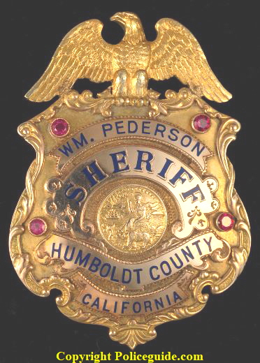 Wm. Pederson Sheriff Humboldt County California shield, made of 14k gold and adorned with four rubies.