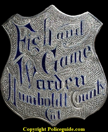 Humboldt County Fish and Game Warden shield, made of sterling silver with hard fired blue enamel lettering.  The enamel work is exceptional and the jeweler reinforced the back of the badge to insure the badge did not flex and pop out the enamel.