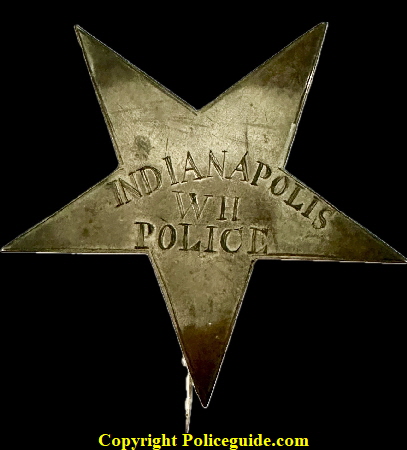 Early Indianapolis Police star with the initials W H in the center.