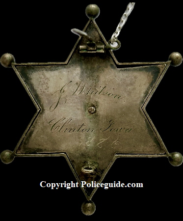 Back of Chief of Police presentation badge to J. Whitson Clinton, Iowa 1886.  Jeweler made, sterling silver.