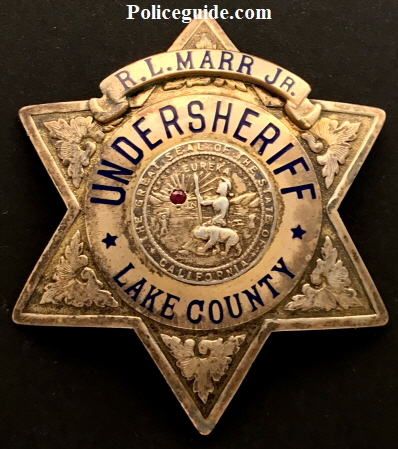R. L. Marr Jr. Undersheriff Lake County badge made by Irvine & Jachens.  Gold filled and sterling.  Dated 1-22-42