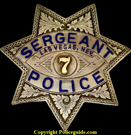 City of Las Vegas Police Sergeant badge #7, worn by Archie Wells, made of sterling silver by Irvine & Jachens S. F. and has the International Jewelry Workers Union No. 64 stamp. City of Las Vegas Police Sergeant badge #7, worn by Archie Wells, made of sterling silver by Irvine & Jachens S. F. and has the International Jewelry Workers Union No. 64 stamp.