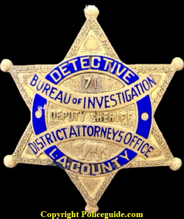 Los Angeles County Detective Bureau of Investigation District Attorneys Office Deputy Sheriff badge #71. 