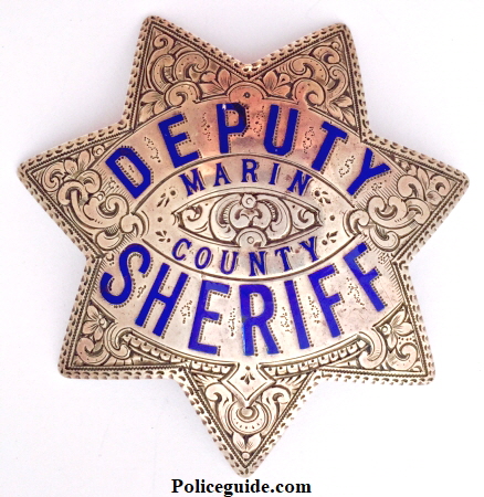 Sterling silver Marin County Deputy Sheriff badge with hard fired enamel and beautiful hand engraving.