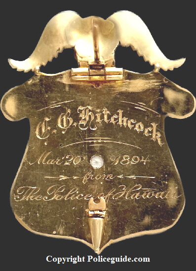 Back of 14k gold badge showing presentation:  C. G. Hitchcock