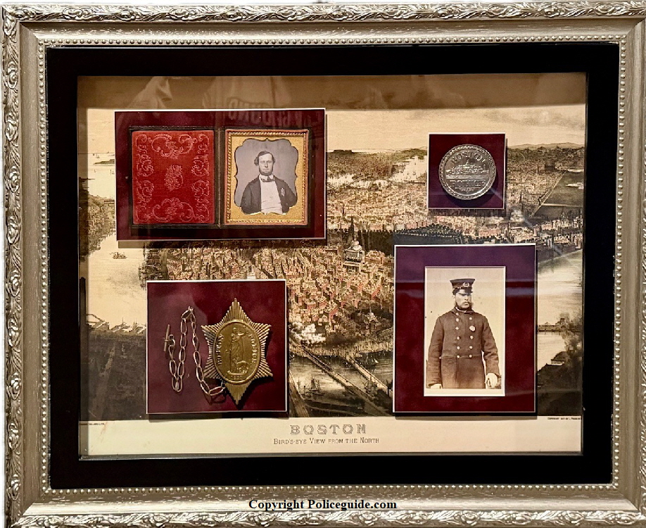 Boston Police display with a 1st issue and 5th issue badge with photos of officeres in uniform. Boston Police display with a 1st issue and 5th issue badge with photos of officeres in uniform.