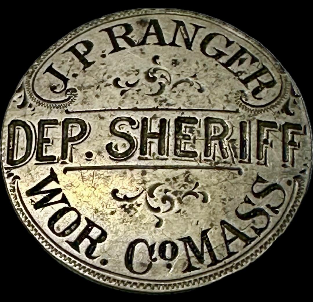 J. P. Ranger Deputy Sheriff Worcester Co. Mass. badge made from a 1893 Barber Half Dollar.