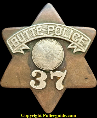 Butte, MT Copper police badge No. 37, issued in May of 1906 and hallmarked Detective Publishing Co. Chicago, IL.  SKU2949