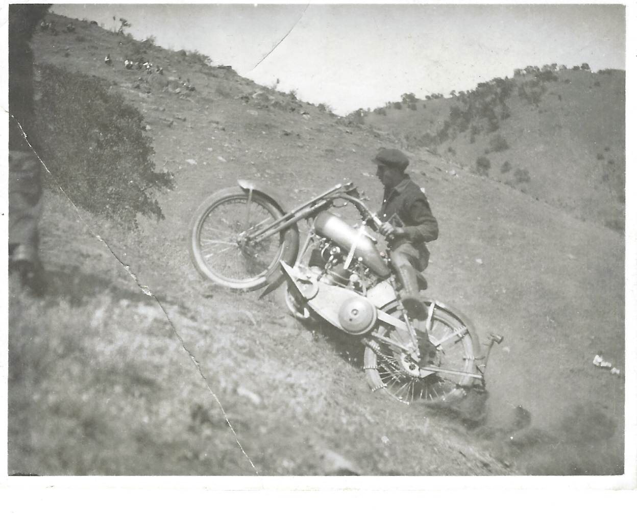 Bert Lundy racing his motorcycle.