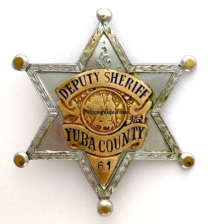 Yuba Co Deputy Sheriff badge No. 61 made by Entenmann Los Angeles.