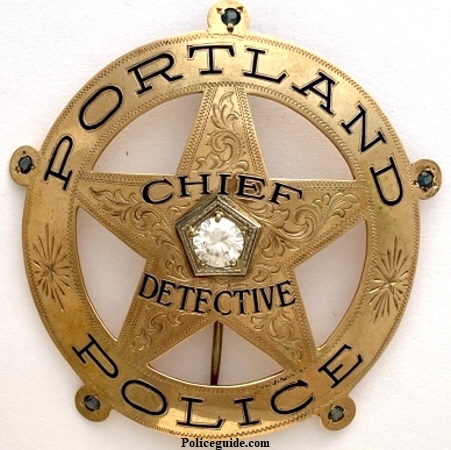 Portland Police Chief Detective, hand engraved, 14k gold with a one karat diamond.