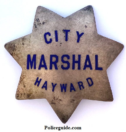 Last Hayward City Marshal badge worn by F. P. Schilling.  Sterling silver and made by Ed Jones Co. Oakland, CAL
