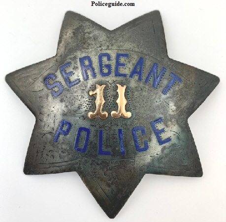 San Francisco Police Sergeant star #11, made of sterling silver with applied 14k gold numbers.  Circa 1886