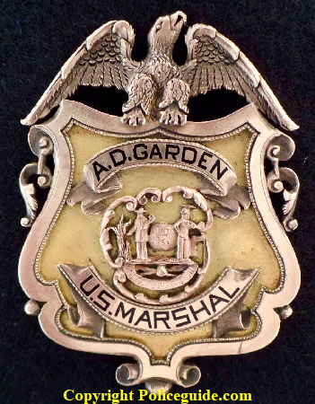 United States Marshal  A.D. Garden badge.  Presented by E. L. Nash & E. L. Priddie 1895.  14k gold.