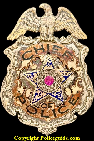 Chief of Police generic eagle top shield, made of sterling  by Ed Jones Co. Oakland, CAL.